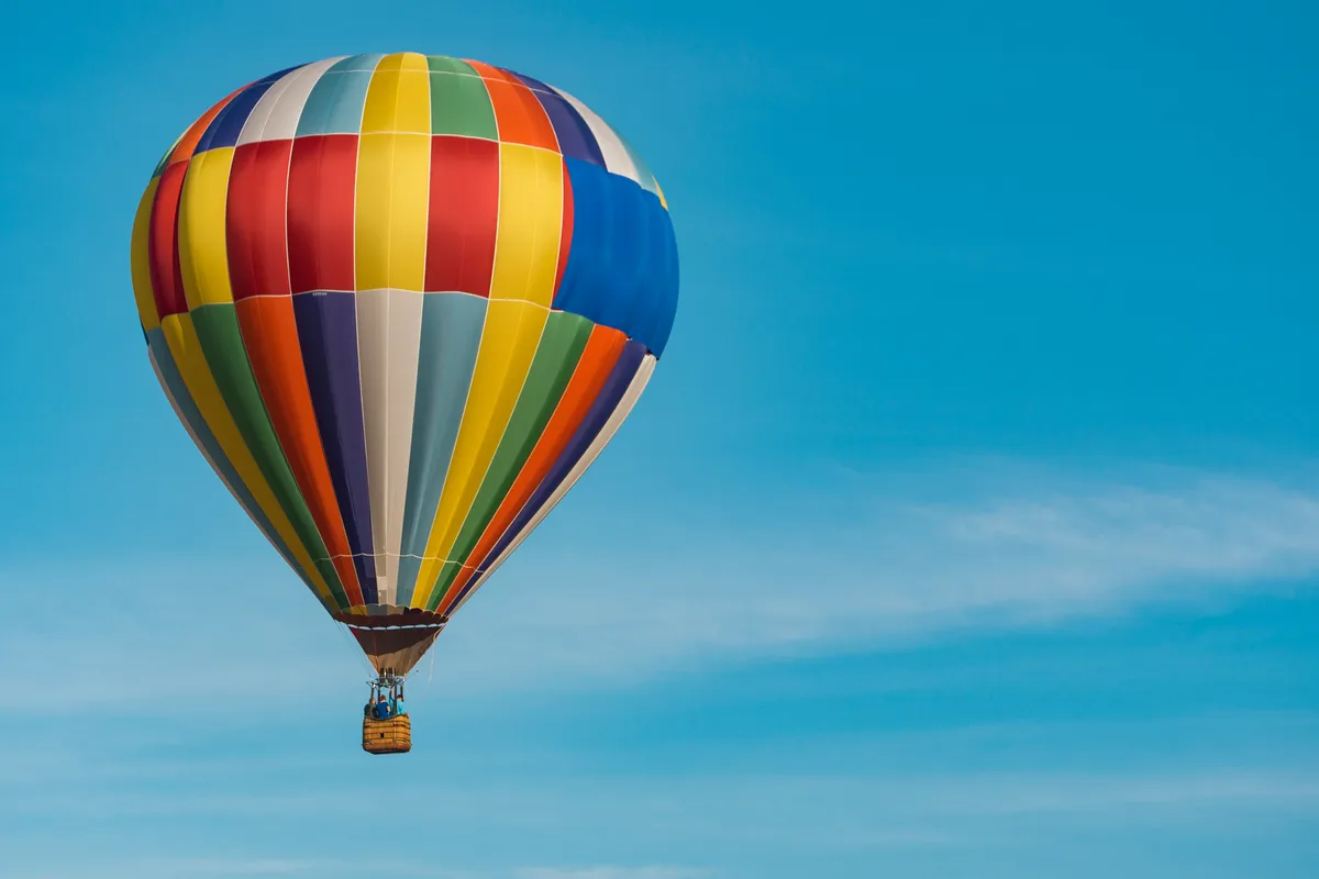 Hot-air balloon in a clear blue sky